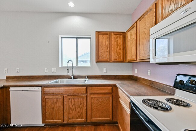 Building Photo - 10950 W Royal Palm Rd