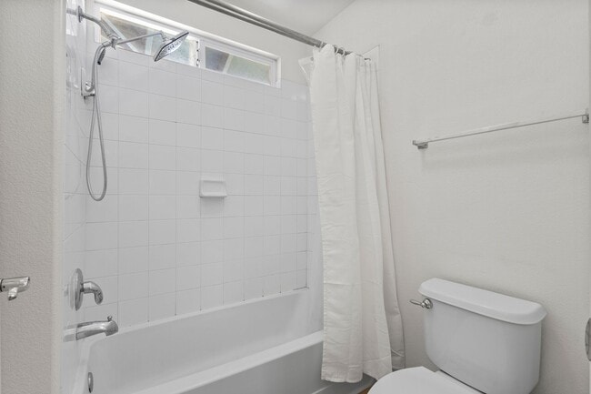 Building Photo - Hillside 3 BR House | W/D • 2 Car Garage • A/C