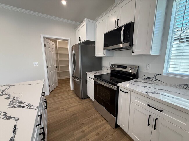 Building Photo - All solar new construction 3/3 house