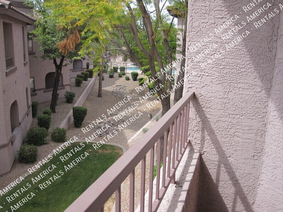 Building Photo - 9555 E Raintree Dr