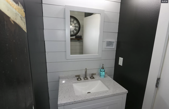 Half bath off the kitchen area offers convenience and privacy - 584 N 8th W