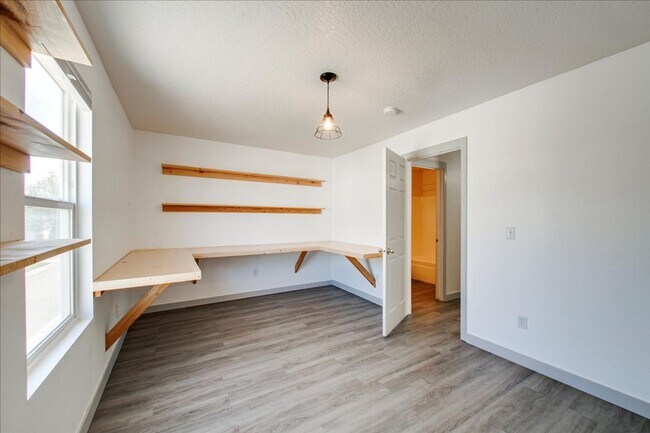 Building Photo - Low-Maintenance Comfort with Community Perks