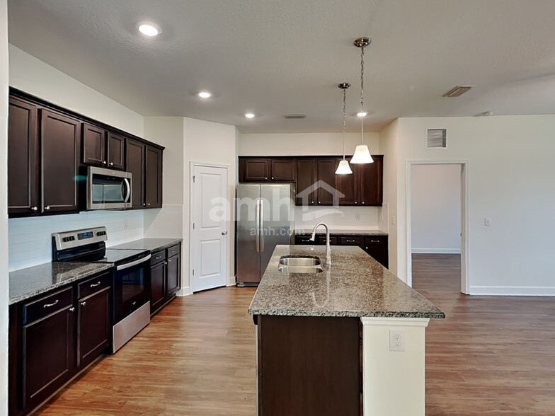 Building Photo - 6614 Hidden Rose Pl