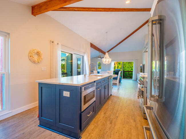 Kitche looking toward living room with sliders to deck - 3250 E De Bazan Ave