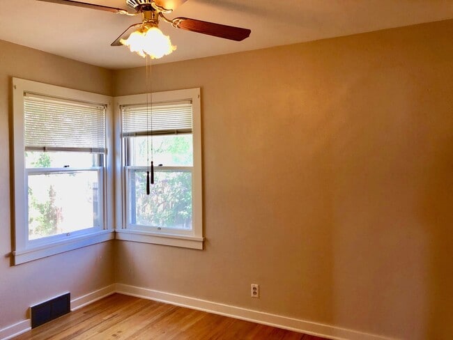 Building Photo - Charming North Hill Home with Beautiful Landscaping and Water Included!