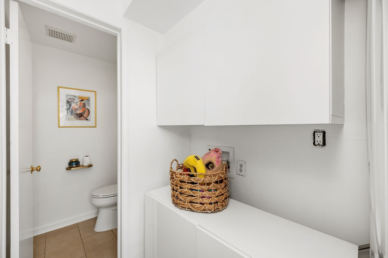 Storage by Laundry and Powder Bath - 4040 Grand View Blvd