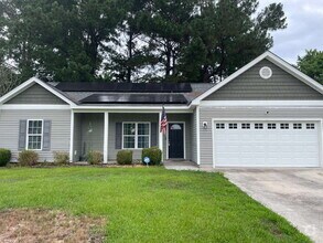 Building Photo - Pet Friendly Three Bedroom Two Full Bathro...