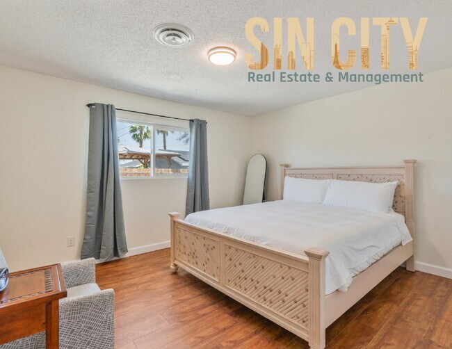 Building Photo - "Charming 4-Bedroom Retreat in Las Vegas –...