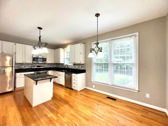Building Photo - Spacious 4BR 2.5BA Home in Adams Farm with...