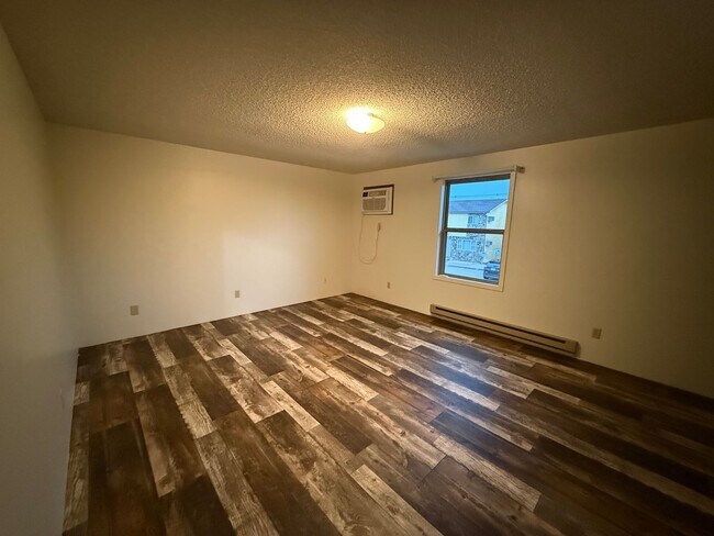 Building Photo - Two bedroom, one and bathroom townhome loc...