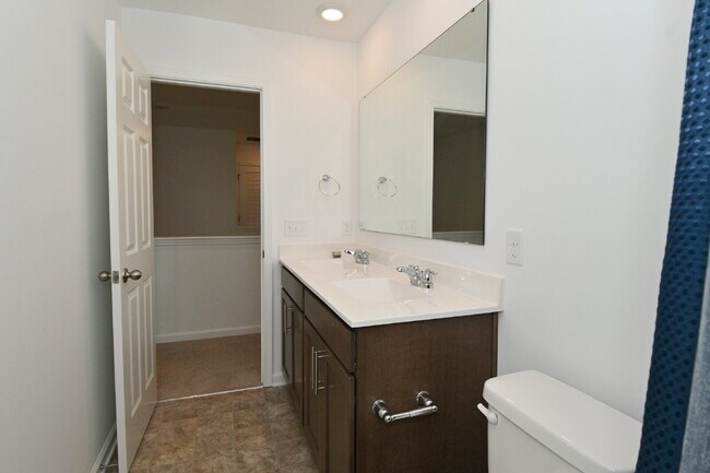 Building Photo - "Spacious 5-Bedroom Retreat with Luxurious Quartz Countertops & Fireplace on Deerberg Drive!"