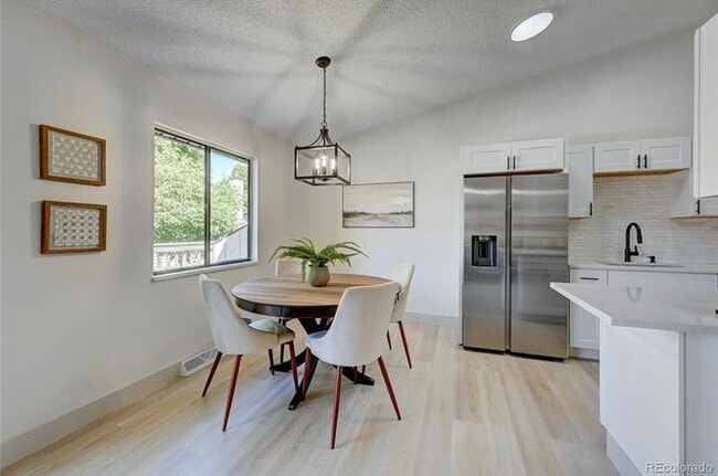 Building Photo - 12028 E Harvard Ave