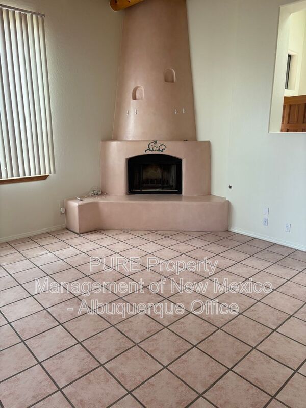 Building Photo - 8220 W Raintree Dr NE