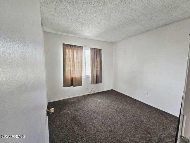 Building Photo - 5446 W Sheena Dr