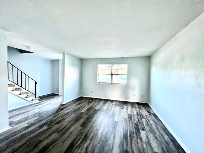 Building Photo - Three-bedroom, two-and-a-half bathrooms in...
