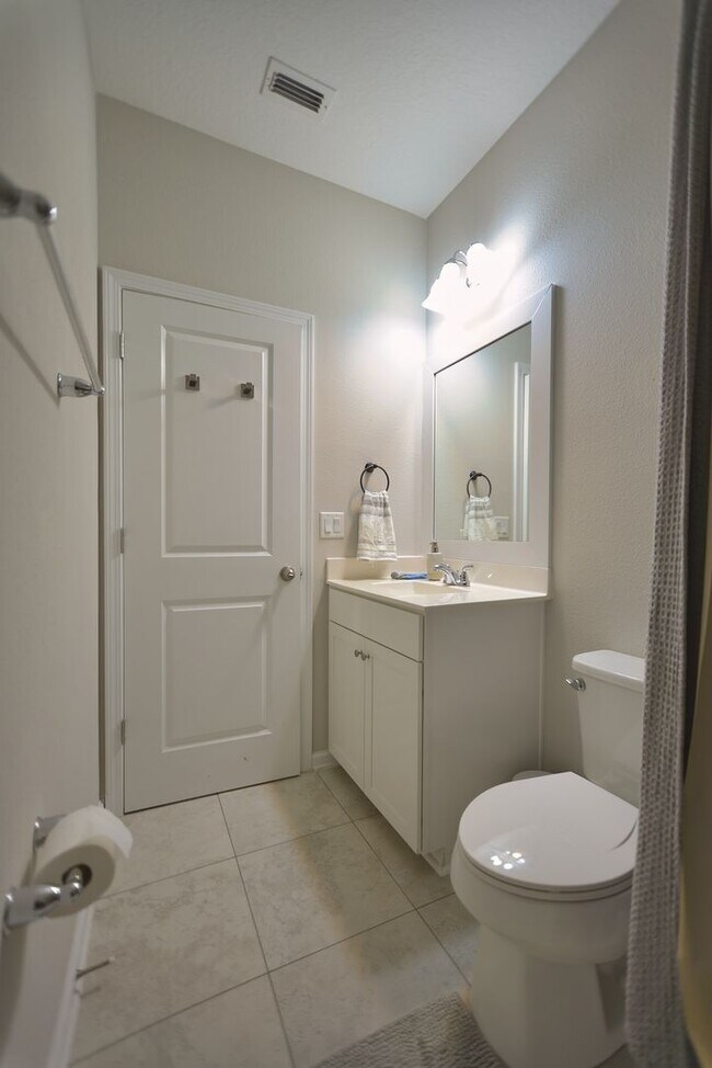 Building Photo - Beautiful Pond-Front Home Near Amelia Concourse