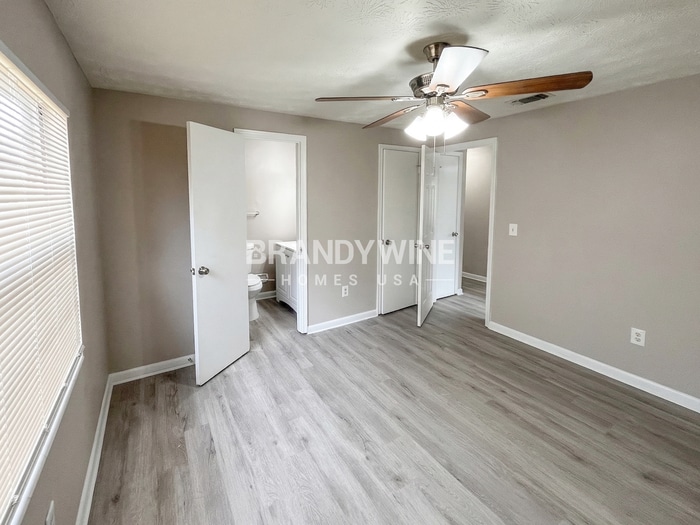 Building Photo - 8409 Red Holly Ln