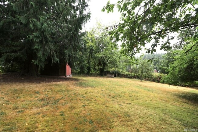 Building Photo - Bremerton Home with Bonus Rooms and Large Yard