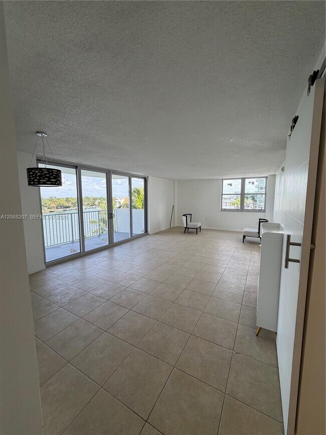 Building Photo - 5838 Collins Ave
