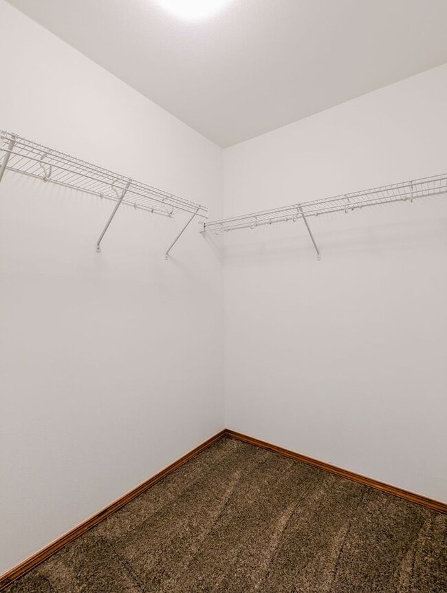 Building Photo - **Move-in Special!!!** Spacious 4 bd, 2.5 ba with 2 car garage and fenced yard!