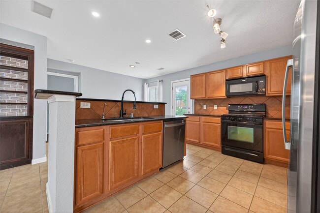 Building Photo - 16238 Ranchland Ln