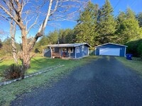 Building Photo - BRING YOUR ATVS - JUST MINUTES FROM THE OREGON DUNES!