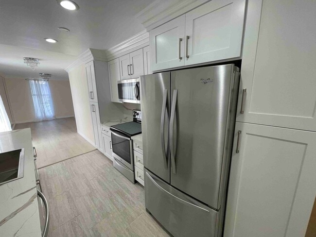 Building Photo - COMPLETELY UPDATED AND REMODELED ENCINO SP...