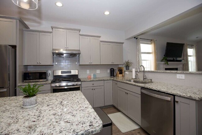 Building Photo - "Spacious 4-Bedroom Gem with 3 Full Baths - 2344 Sq Ft of Comfort on Stackhouse Drive!"