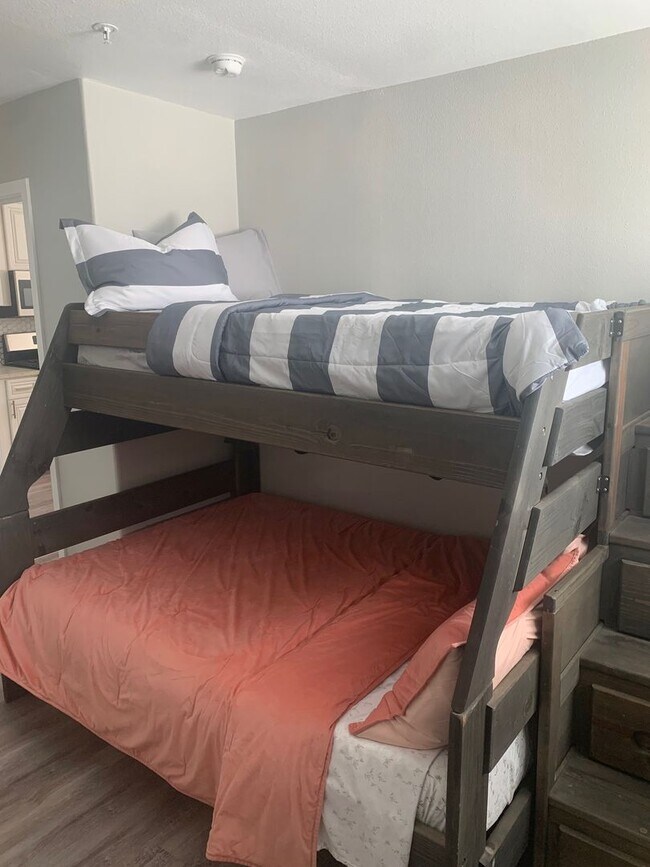 Building Photo - Furnished, Upstairs Apartment with 2 bedrooms and 1 bathroom. Utilities Included!!