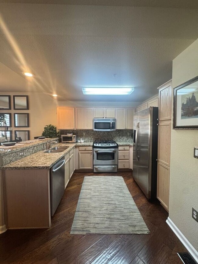 Building Photo - WOW-Factor Alert: Fully Furnished & Remodeled 2BD/2BA First Floor Condo in Wingfield Springs!
