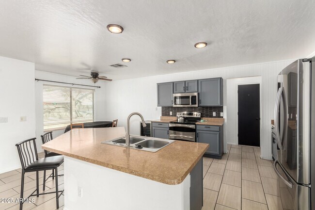 Building Photo - 8812 N 67th Dr