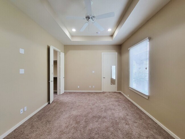 Building Photo - Elegant Gated Townhome Offering Unparallel...