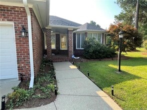 Building Photo - 6560 Windy Creek Way