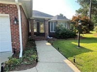 Building Photo - 6560 Windy Creek Way