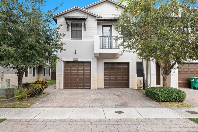 Primary Photo - Northwest 61 Lane, Doral, FL 33178 - 4 BR 3.5 BA Townhouse