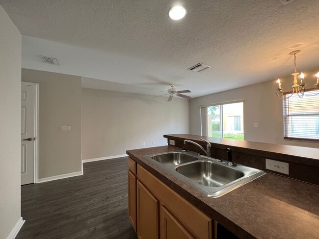 Building Photo - Bright 2BR 2.5BA Home w/ Community Pool/Playground Access • Full-Size Appliances • 1-Car Garage i...