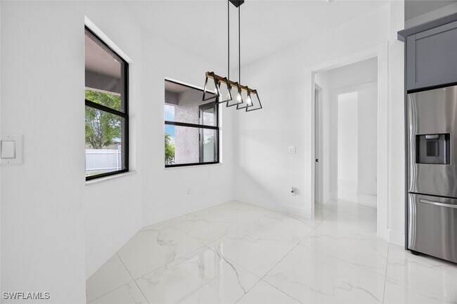 Building Photo - 1609 Nelson Rd N