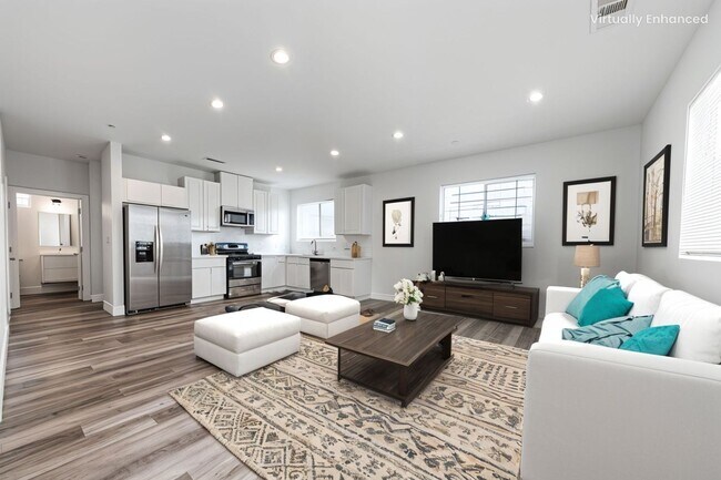 Building Photo - Now Leasing – $3,309 Effective Rent (True ...