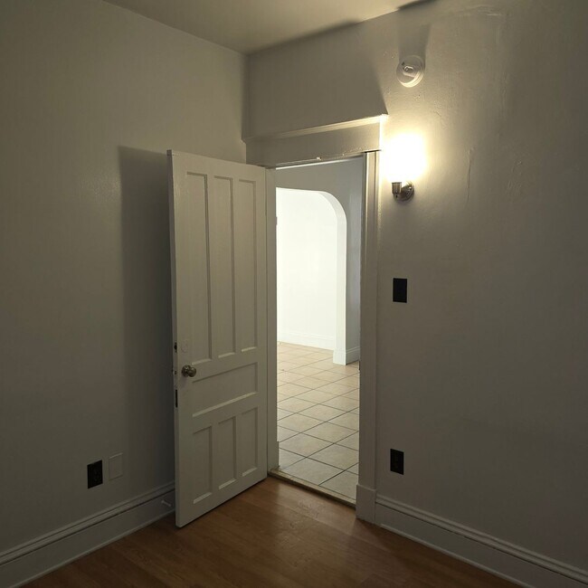 Building Photo - Large remodeled 4 bedroom with off street parking available