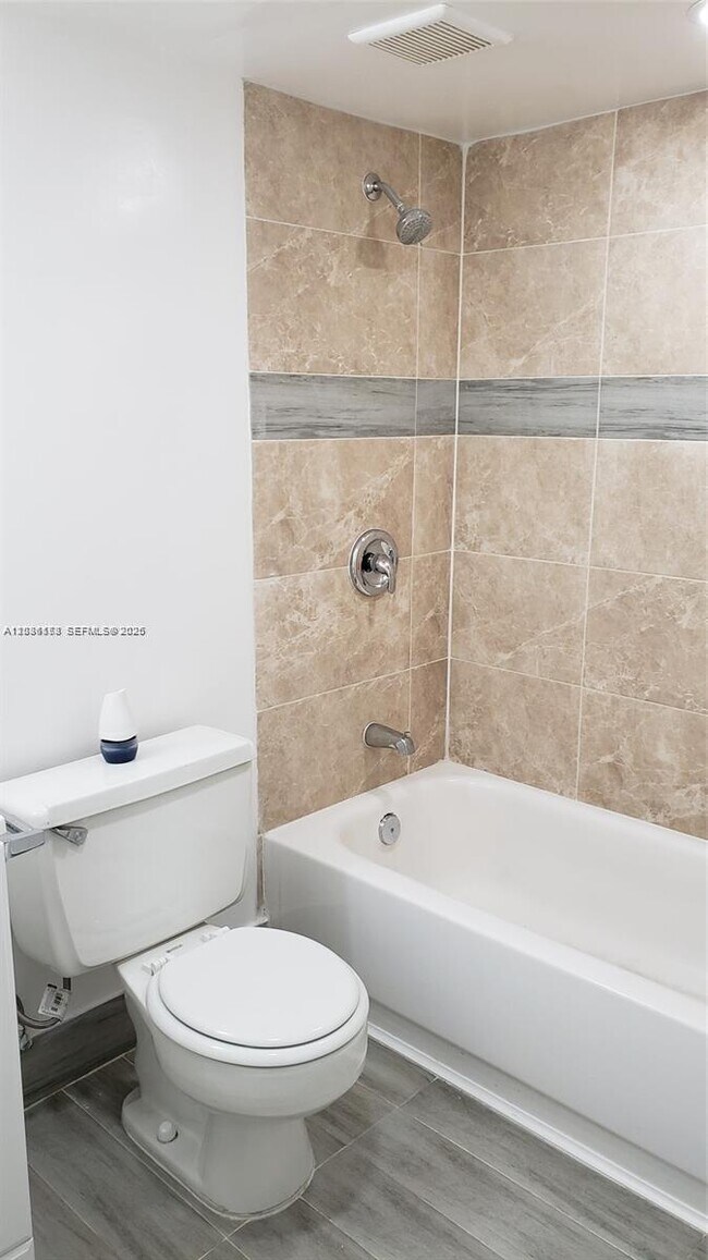 Building Photo - 1325 W 68th St