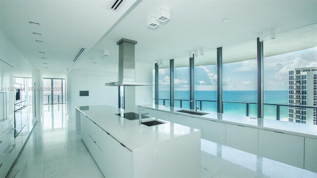 Building Photo - 19575 Collins Ave