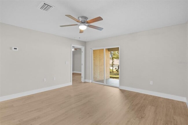 Building Photo - 9170 N Travis Dr