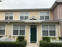 Building Photo - Townhouse on 1st floor in guard gated comm...