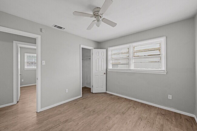 Building Photo - Updated Home with Gorgeous Floors & Large Backyard