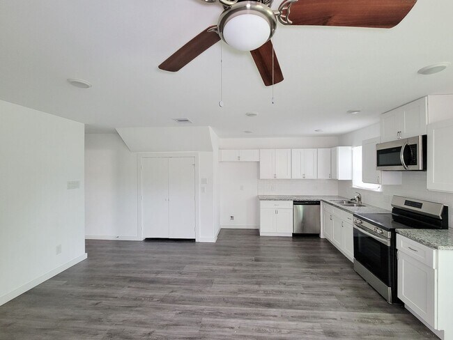 Building Photo - This newly constructed 3-bedroom, 2-bathroom unit offers modern living with 1,150 sq ft of space....