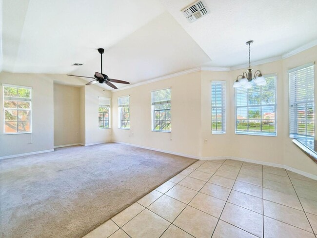 Building Photo - Beautiful 3-Bedroom Condo with 2-Car Garag...