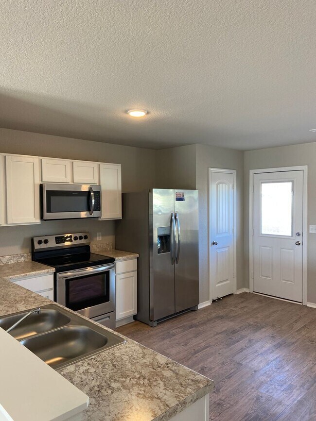 Building Photo - PRE-LEASING NOW | Stylish 4 Bed, 2 Bath Home in Conrad Court