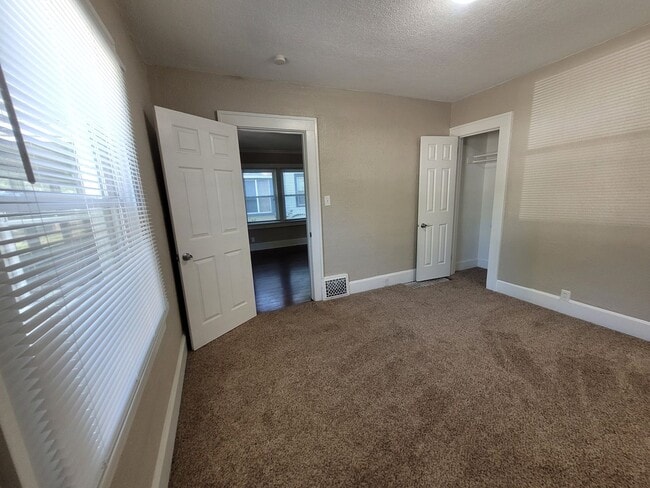 Building Photo - Two bedroom, One Bathroom Home with Partially fenced back yard