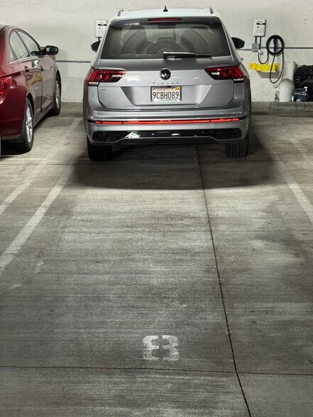 Tandem parking with 2 electric car chargers - 1951 N Beachwood Dr