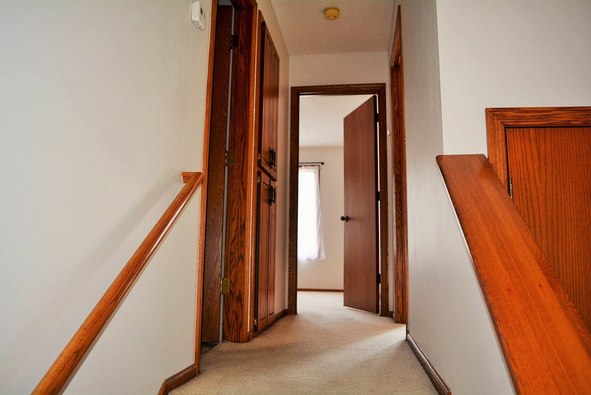 Hallway leading to upstairs bed & bath - 2002 Mesabi Ave